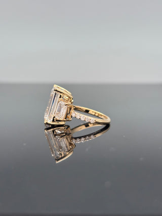 7 Carat Emerald Cut Three-Stone Ring with Emerald Side Stones (LGD)