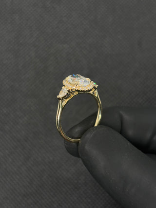 3 Carat Moval Old Miner Cut Set in 3-Stone Ring (Pear on sides)