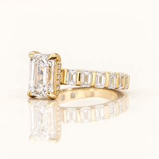5.48 Carats Emerald-Cut F VS1 (LGD) Diamond Ring Framed by Baguette-Set Diamonds in 14K Gold